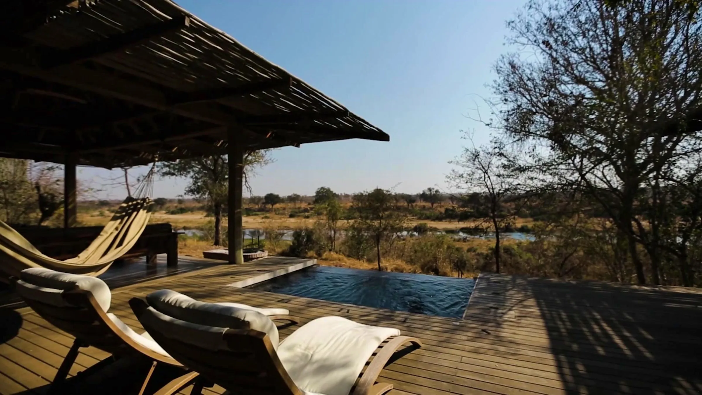 Laniakea – Covered pool deck overlooking the river